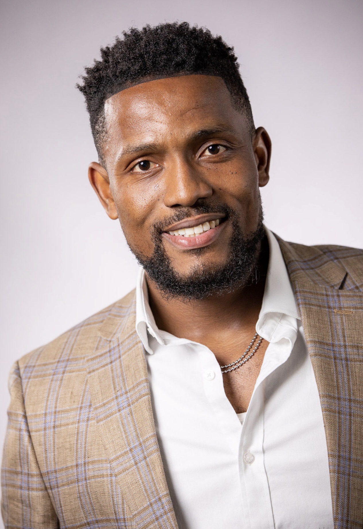 Portrait of Jonah Okebulu, founder of Salute Yourself Initiative